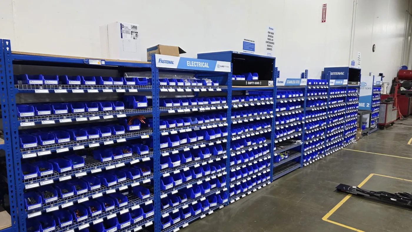 Industrial parts bin wall showing high SKU density for MRO inventory